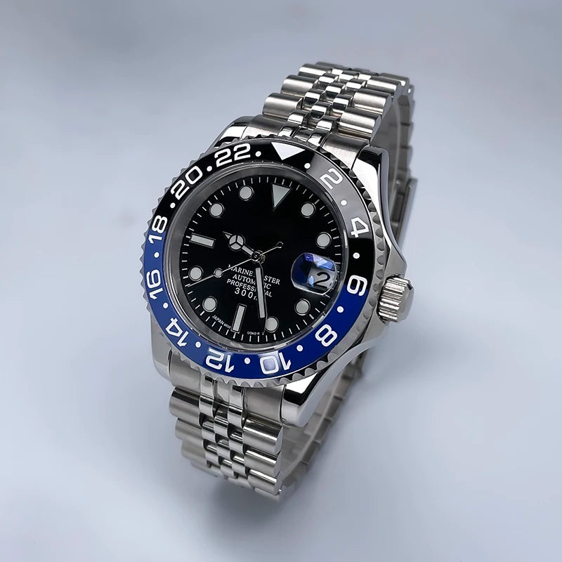 40 mm átmérőjű, YM Design kétirányban forgó keret, zafírüveg, világító számlap, NH35 szerkezethez, Jubile szíjjal ellátott luxus férfi karóra