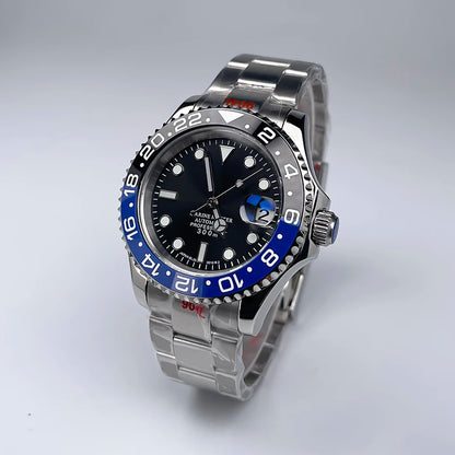 40 mm átmérőjű, YM Design kétirányban forgó keret, zafírüveg, világító számlap, NH35 szerkezethez, Jubile szíjjal ellátott luxus férfi karóra