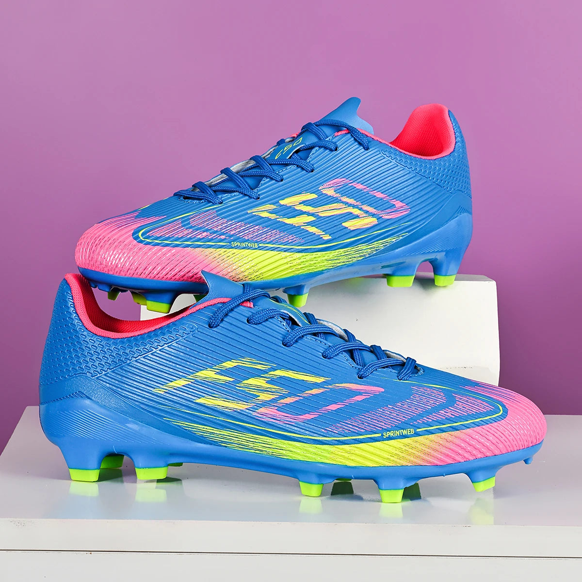 Chaussures de football respirantes pour hommes, chaussures de sport antidérapantes à longues crampons FG/AG pour l'extérieur et l'intérieur, un incontournable pour les fans