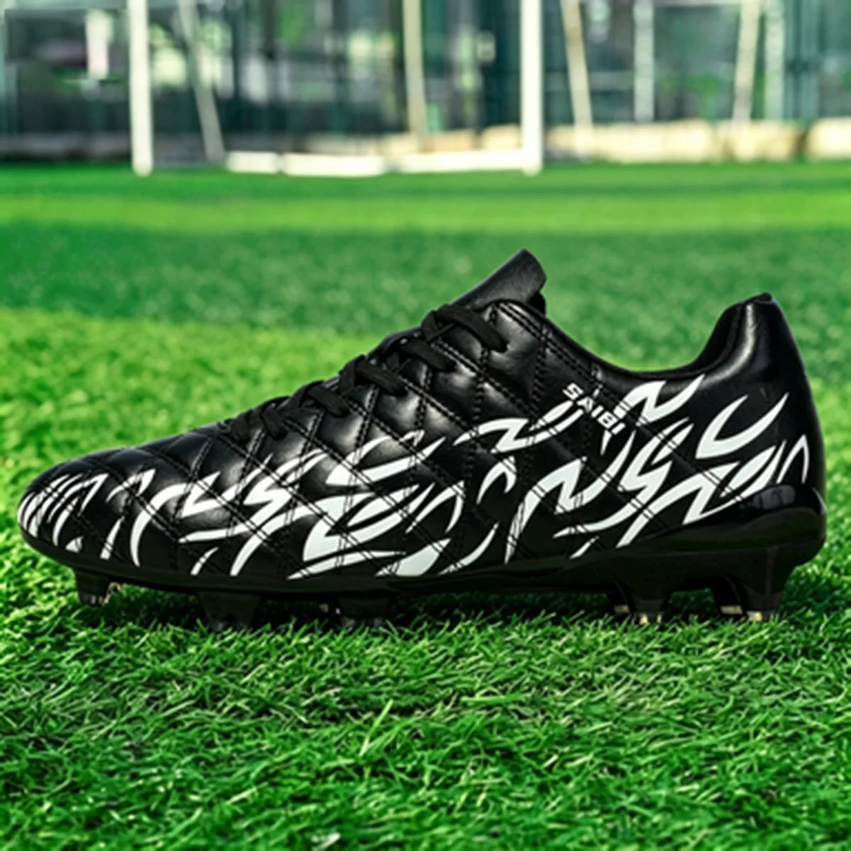 Chaussures de football pour hommes, modèle AG FG hybride, semelle extérieure en caoutchouc résistant à l’usure, tige en PU respirant, idéales pour les matchs sur gazon naturel.