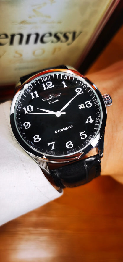 Montre classique pour homme – Style rétro avec calendrier et aiguilles bleues, mouvement mécanique automatique, marque de prestige, boîtier en acier et bracelet en cuir